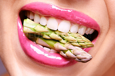 Buy stock photo Woman, lipstick and closeup of vegetable in mouth for beauty, nutrition and healthy with vegan cosmetic product. Cruelty free makeup, cosmetology and asparagus, pink lip gloss for aesthetic or art
