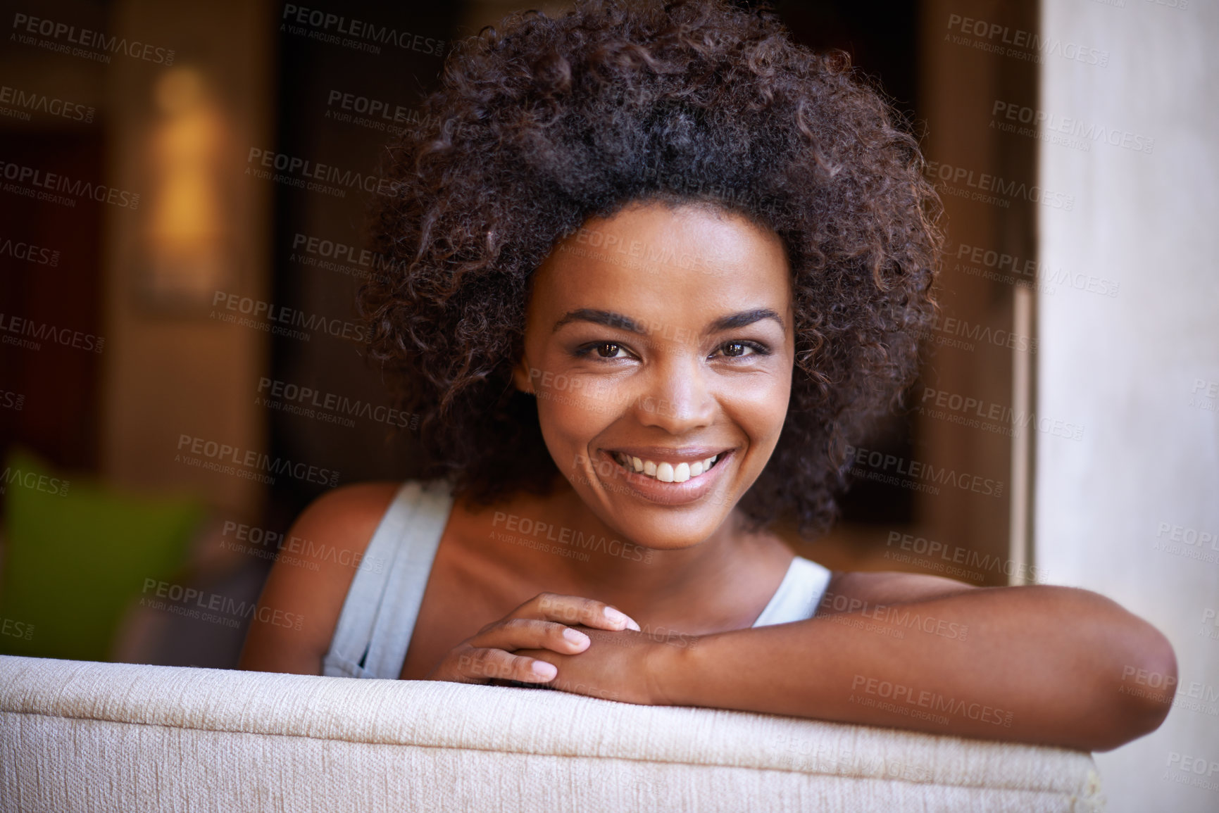 Buy stock photo Smile, sofa and portrait of woman in living room for weekend rest, break or afternoon free time. Relax, happy and face of black female person on couch with positive mood, satisfaction and enjoyment
