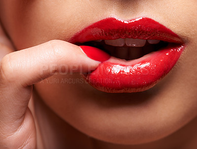 Buy stock photo Cropped shot of a woman pressing her finger against her lip