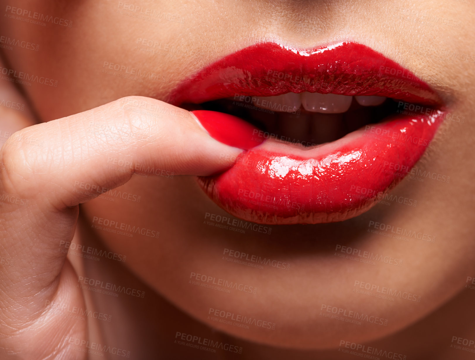 Buy stock photo Cropped shot of a woman pressing her finger against her lip