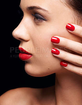Buy stock photo Makeup, manicure and young woman in studio with trendy, beauty and face routine with red lips. Cosmetics, nail polish and profile of female model with facial cosmetology treatment by black background