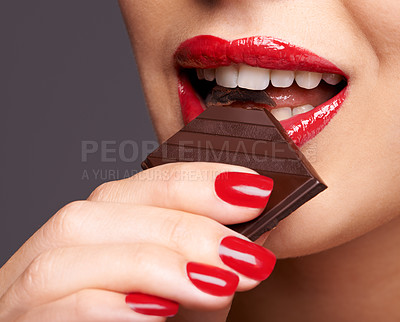 Buy stock photo Makeup, beauty and woman with chocolate in studio for lipstick cosmetics, manicure and skincare in gray background. Sweets, macro and female model for cocoa bar unhealthy snack or eating candy