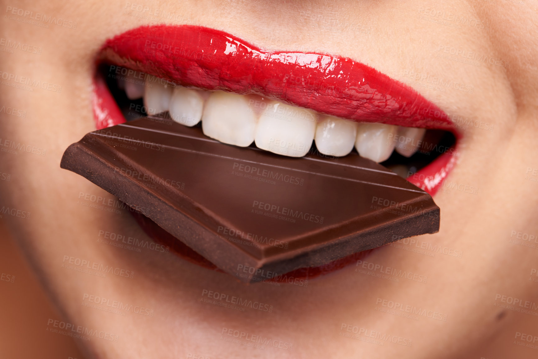 Buy stock photo Chocolate bar, beauty and woman with red lips for lipstick cosmetics, makeup and skincare. Sweets, macro and female model person in cheat meal for cocoa product, unhealthy snack or eating candy 