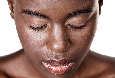 Buy stock photo Closeup of black woman, beauty or face with makeup, cosmetics or healthy skin isolated in studio. Eyes closed, person or African girl model with glow aesthetic or skincare results on white background