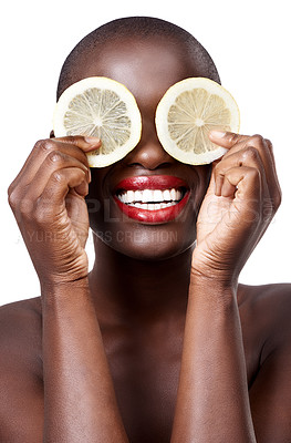 Buy stock photo Black woman, smile and lemon skincare in studio in organic dermatology routine or wellness. White background, face and happy African model with facial fruit, diet food and eyes product for beauty