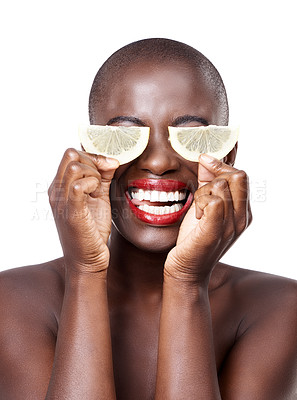 Buy stock photo Woman, lipstick and lemon skincare in studio for organic dermatology routine, youth or wellness. White background, happy and African model with facial glow, fruit diet and eyes product for beauty