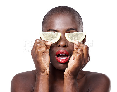 Buy stock photo Woman, surprise and lemon skincare in studio for organic dermatology routine, youth or wellness. White background, shock and African model with facial glow, fruit diet and eyes product for beauty