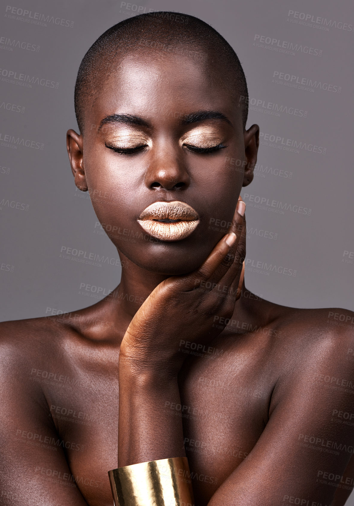 Buy stock photo Jewelry, face and skin of black woman for makeup, beauty and cosmetics isolated on gray background. Person, African lady and eyeshadow with lipstick in studio for dermatology, gold head or skincare