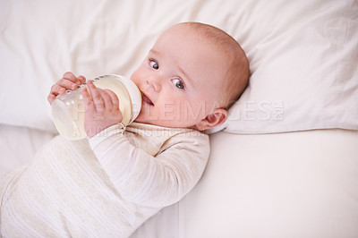 Buy stock photo Shot of a cute and adorable baby boy at home