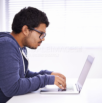 Buy stock photo Elearning, typing and man with laptop for research, study or university for education, knowledge and opportunity. Computer, reading and college student writing report for online course with glasses.