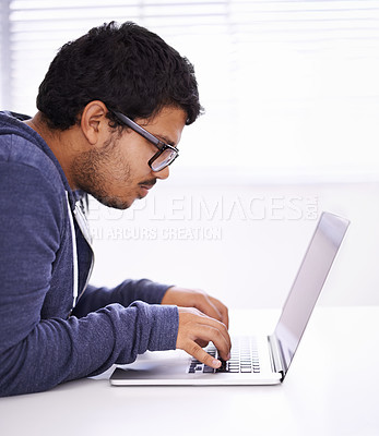 Buy stock photo University, focus and man typing with laptop for research, study or elearning for education, knowledge and opportunity. Computer, reading and college student writing for online course with glasses.