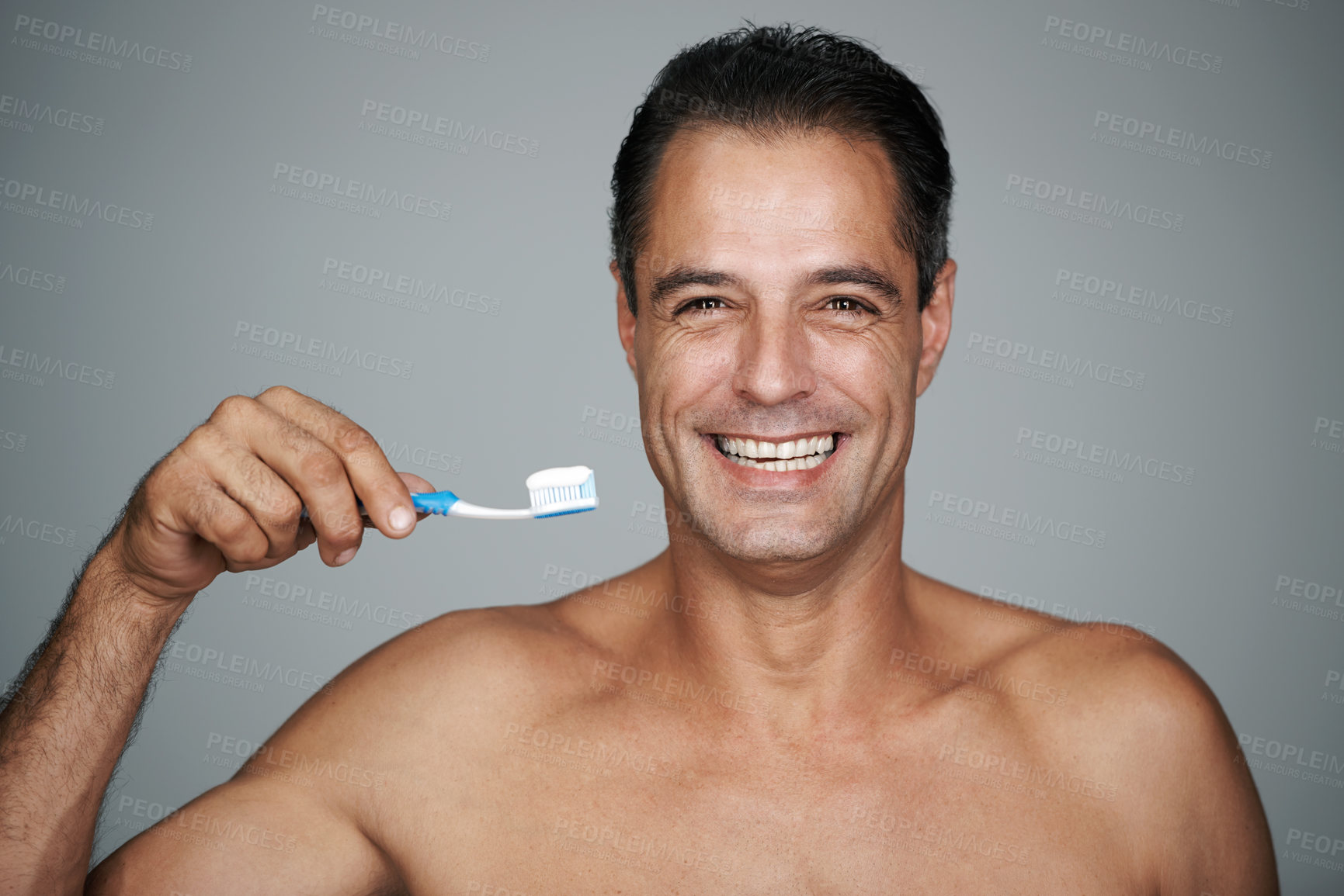 Buy stock photo Man, studio and toothbrush for fresh smile, dental and oral hygiene for mature person. Teeth, breath product with toothpaste and mouth health, whitening and wellness or cleaning for confidence