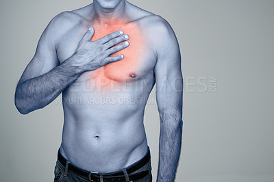 Buy stock photo Medical, chest pain and man with discomfort in studio with inflammation, heartburn or injury. Red glow, shirtless and person with healthcare emergency, ache or strain by gray background with mockup.