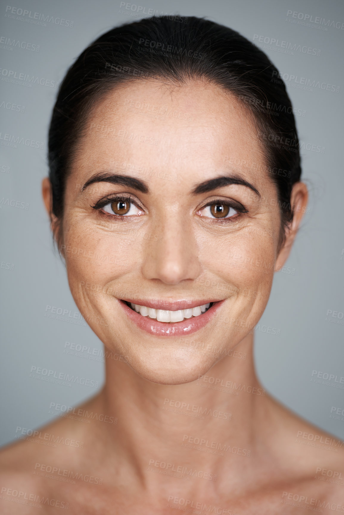 Buy stock photo Woman, beauty and portrait with smile, skin and care for treatment and proud. Model, cosmetics and natural for lip gloss, glow or aesthetic for antiaging confident isolated on grey studio background