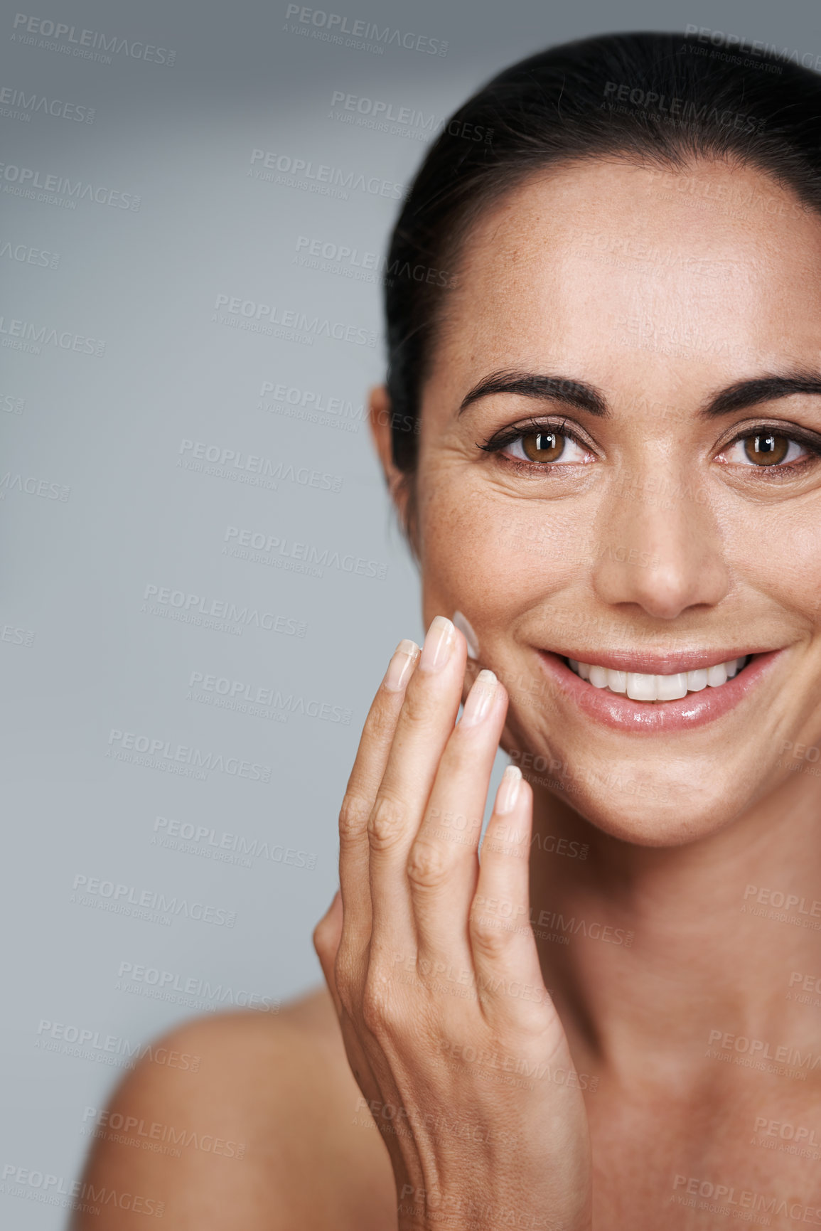 Buy stock photo Smile, face cream and portrait of woman in studio with beauty, natural and anti aging routine. Happy, cosmetic and mature person with spf, lotion or sunscreen for dermatology by gray background.