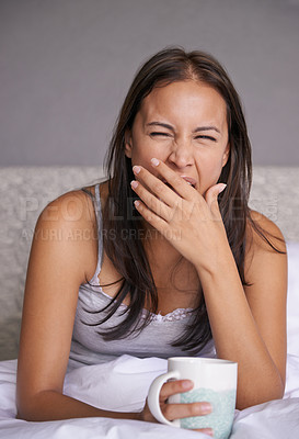 Buy stock photo Woman, yawn or coffee in bed for energy to wake up in peace, morning routine for mental health. Tired, sleepy or female person in cozy, comfort or warm for tea as soothing, self care or stress relief