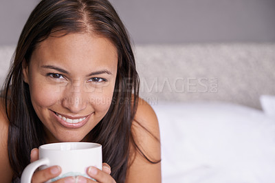 Buy stock photo Portrait, woman or coffee in bed to rest, smile or sit in peace, morning or routine as mental health. Happy, female person or tea in calm, break or stress relief in lazy Sunday comfort in bedroom