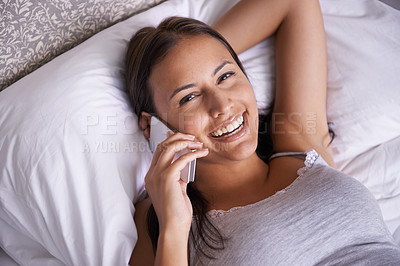Buy stock photo Relax, portrait and phone call for woman on bed with smile on soft mattress of bedroom in apartment. Pillow, female person and rest of girl talking with mobile, technology and happiness on face