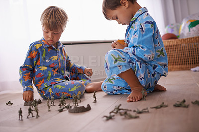 Buy stock photo Boys, playing and kids in pajamas with toys for fun with action figures, car or games. Brothers, child development and young children bonding together in playroom for learning at family home.