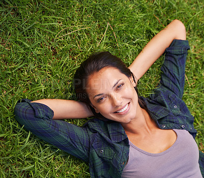 Buy stock photo Relax, nature and portrait of woman on grass for peace, satisfaction and good mood in outdoor park. Summer, green lawn and face of woman with happiness for rest, wellness and carefree enjoyment