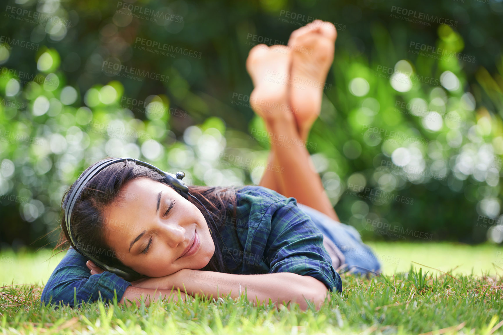 Buy stock photo Grass, park and woman with headphones, listening to music and streaming audio with peace, relaxing or summer. Person in a garden, outdoor or girl with headset or podcast with radio, sunshine or sound
