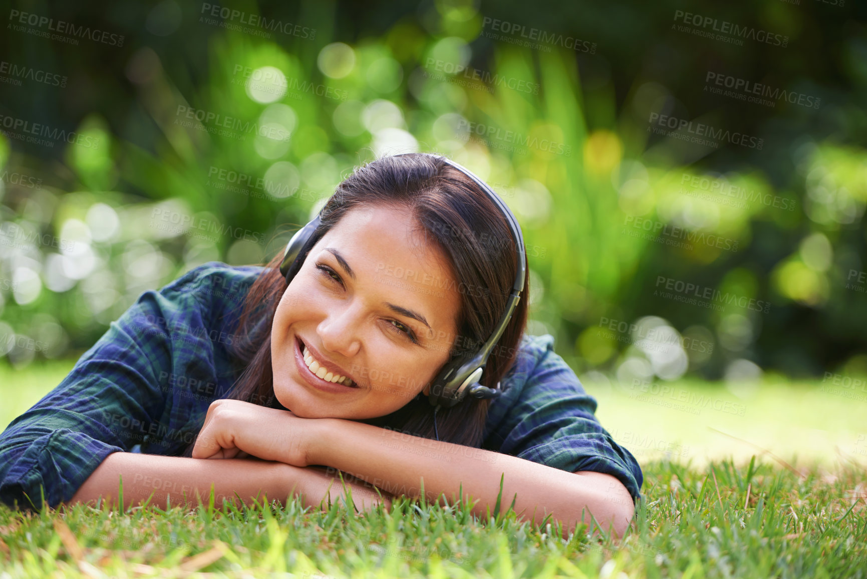 Buy stock photo Park, portrait and woman with headphones, smile and listening to sound or streaming music with peace, relaxing or sunshine. Person, outdoor or girl with headset or podcast with radio, summer or audio