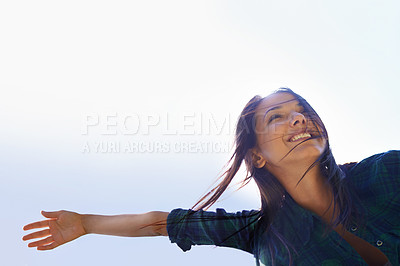 Buy stock photo Mockup, sky and arms with a woman outdoor in nature for fun, freedom or adventure in summer from below. Energy, celebrate life or wellness with a happy young female person outside with a smile