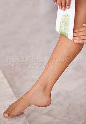 Buy stock photo Closeup, leg and woman with waxing, luxury and wellness with dermatology and pamper in a bathroom. Person, lady and girl with hair removal and cosmetics with skincare and smooth with healthy skin