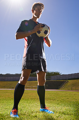 Buy stock photo Man, fitness and confident soccer player on field, athlete and competitive for match or game. Male person, serious and determined for competition, outdoors and ready for football challenge or sports