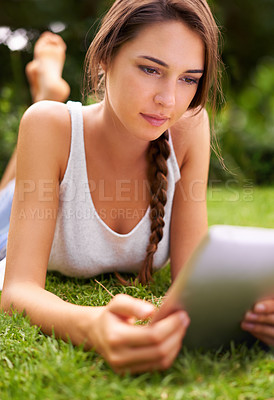 Buy stock photo Backyard, grass and woman relax with tablet, outdoor and  garden in home for peace with technology. Summer, nature and girl online with connection to internet to read ebook on app for happiness