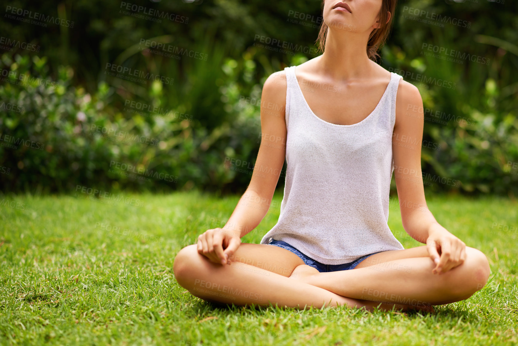 Buy stock photo Meditation, yoga and woman on grass, lawn and garden outdoor for wellness, peace and to relax in nature. Female person, young lady and gen z girl in lotus position by trees, plants and environment