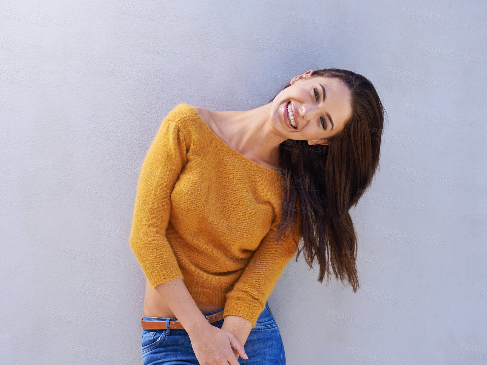 Buy stock photo Portrait, fashion and happy woman on a wall, model or funny girl laughing isolated on a purple background mockup space. Smile, trendy and person in casual clothes, jeans or stylish sweater in Italy