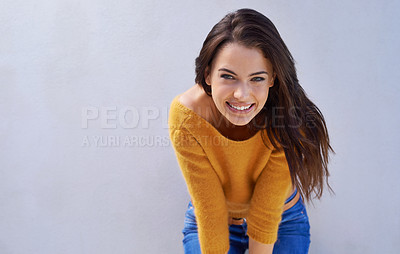 Buy stock photo Woman, smile and mockup with happy, playful and proud with sweater for comfort. Model, fashion and positive with natural, fun and confidence for trendy style meme isolated on white wall background