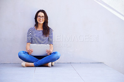 Buy stock photo Portrait, woman and relax on floor with computer for remote work or freelancing, web browsing and research for idea or project. Female person, casual and laptop for internet, social media and blog.