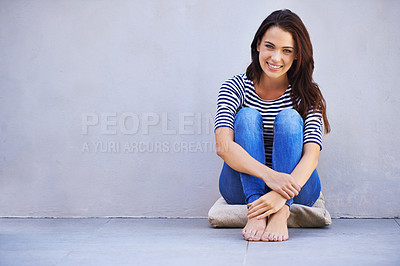 Buy stock photo Portrait, casual outfit and woman with fashion, smile or cheerful girl on a grey background. Person, wall or model on the ground or stylish clothes with confidence or proud with peace, happy or funny