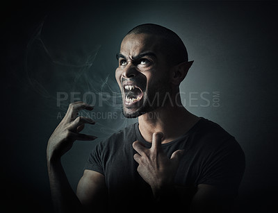 Buy stock photo Computer manipulated shot of a man turning into a monster