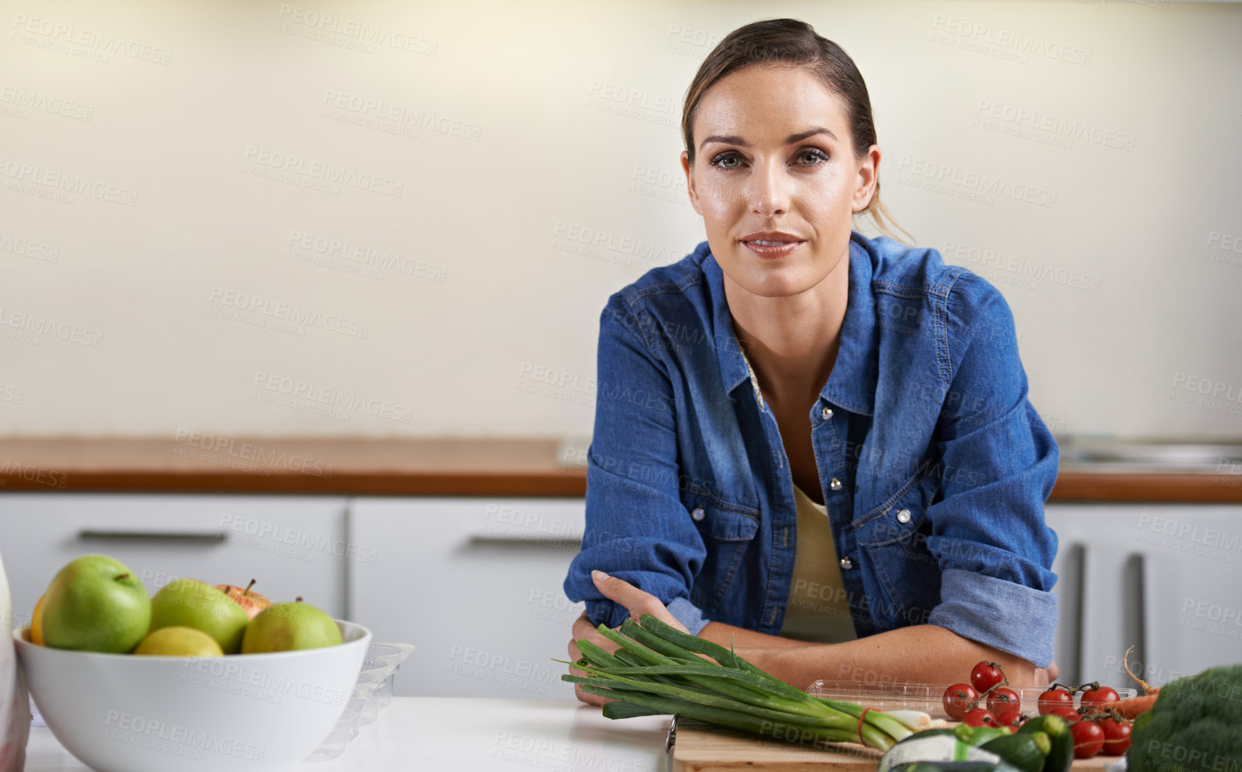 Buy stock photo Cooking, kitchen and portrait of woman with vegetables on wooden board for wellness, meal prep and nutrition. Healthy diet, home and person with ingredients for vegetarian dinner, lunch and supper