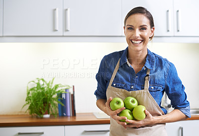 Buy stock photo Happy woman, portrait and kitchen with apple for nutrition, natural diet or healthy eating at home. Face of female person with smile and organic green fruit for vitamins, fiber or health and wellness