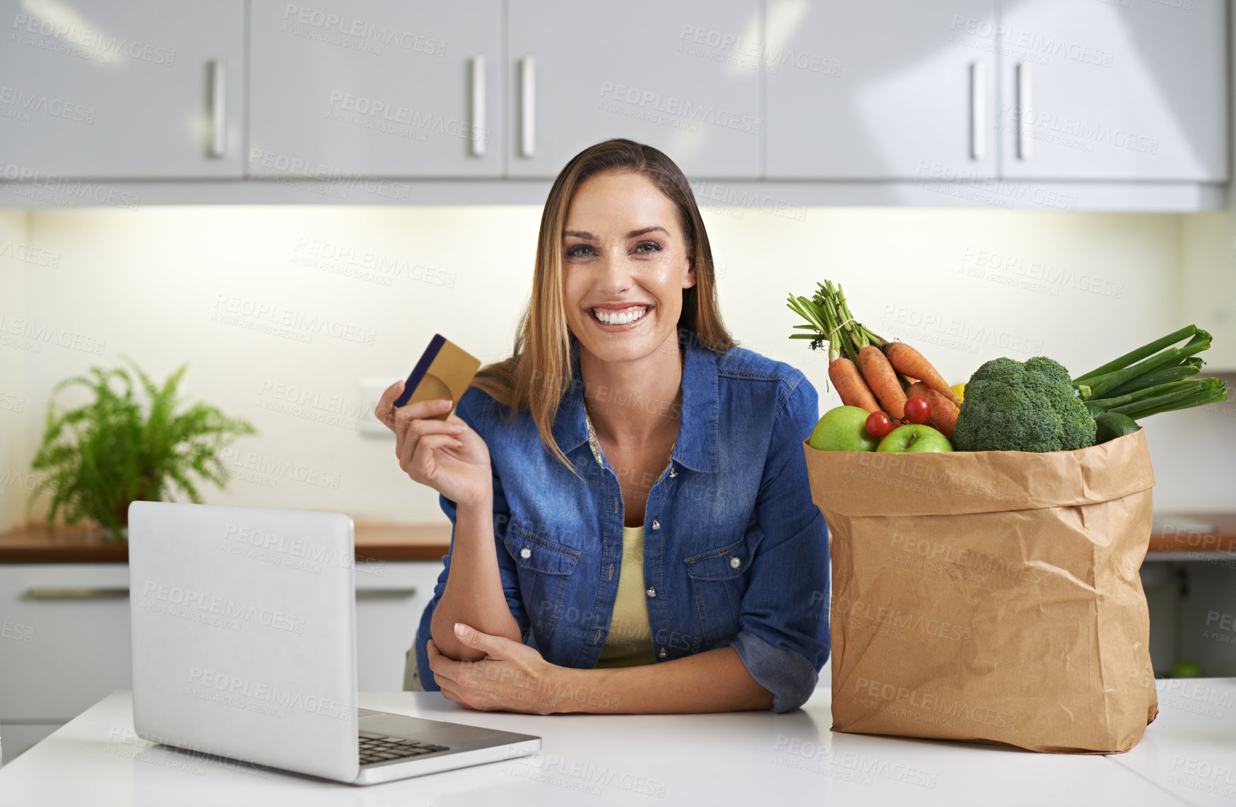 Buy stock photo Happy woman, laptop and credit card with grocery bag for payment, online shopping or order in kitchen at home. Portrait of female person with smile, computer or debit in purchase or delivery at house