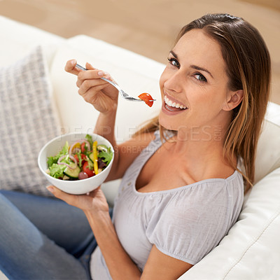 Buy stock photo Portrait, happy woman and eating salad on sofa for lunch and healthy food for nutrition in home. Smile, face and young lady with vegetables in above, vitamins and detox on weekend in modern apartment