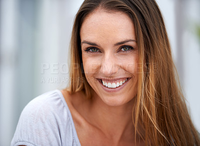 Buy stock photo Portrait of a beautiful woman smiling at the camera