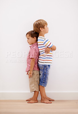 Buy stock photo Boy, children or back to ignore, angry or conflict as bad emotional mistake in worry or frustration. Kids, friends or frustrated in fight, problem or argument for moody tantrum, behavior or attitude