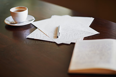 Buy stock photo Shot of stationery and a cup of coffee on a desk