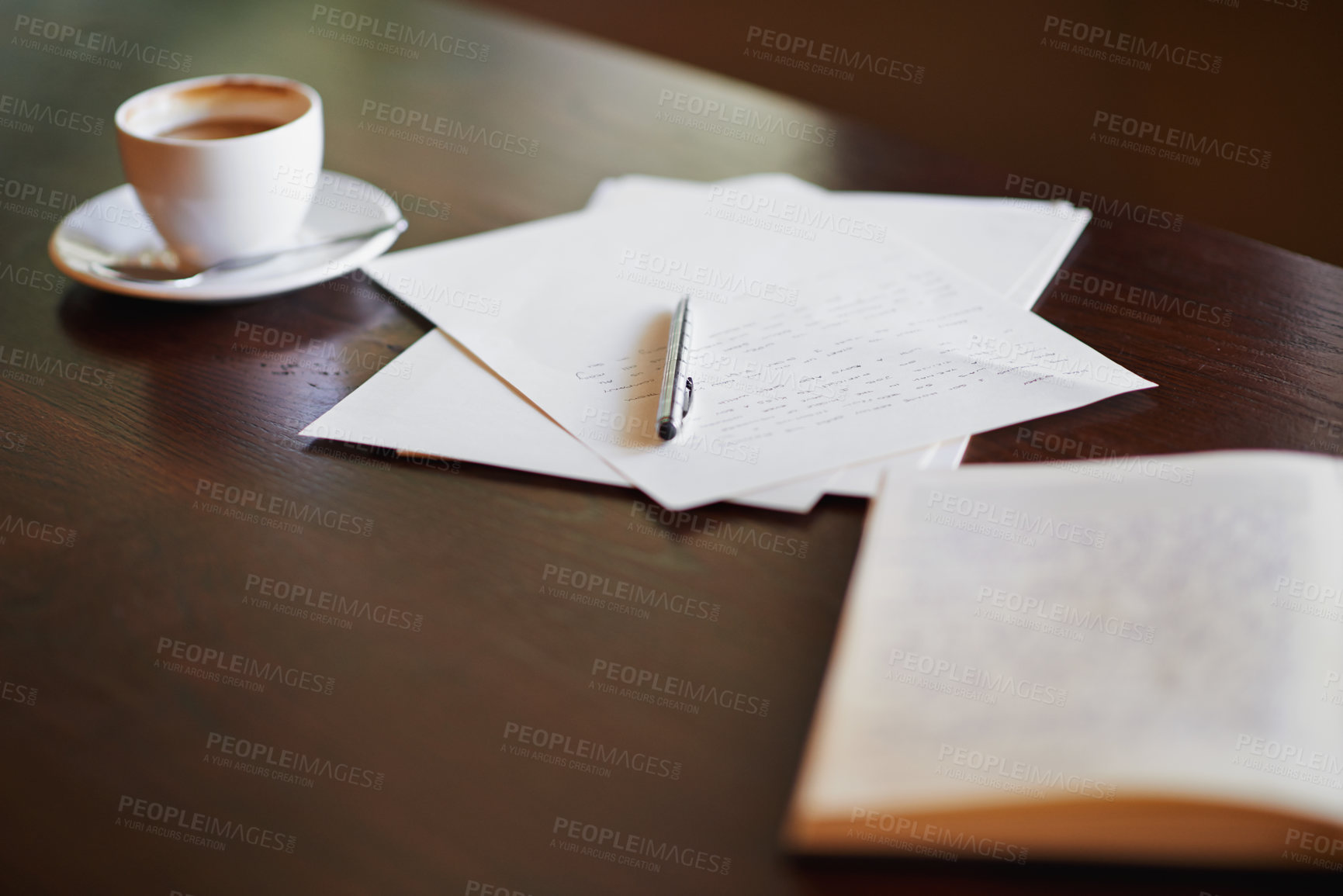 Buy stock photo Shot of stationery and a cup of coffee on a desk