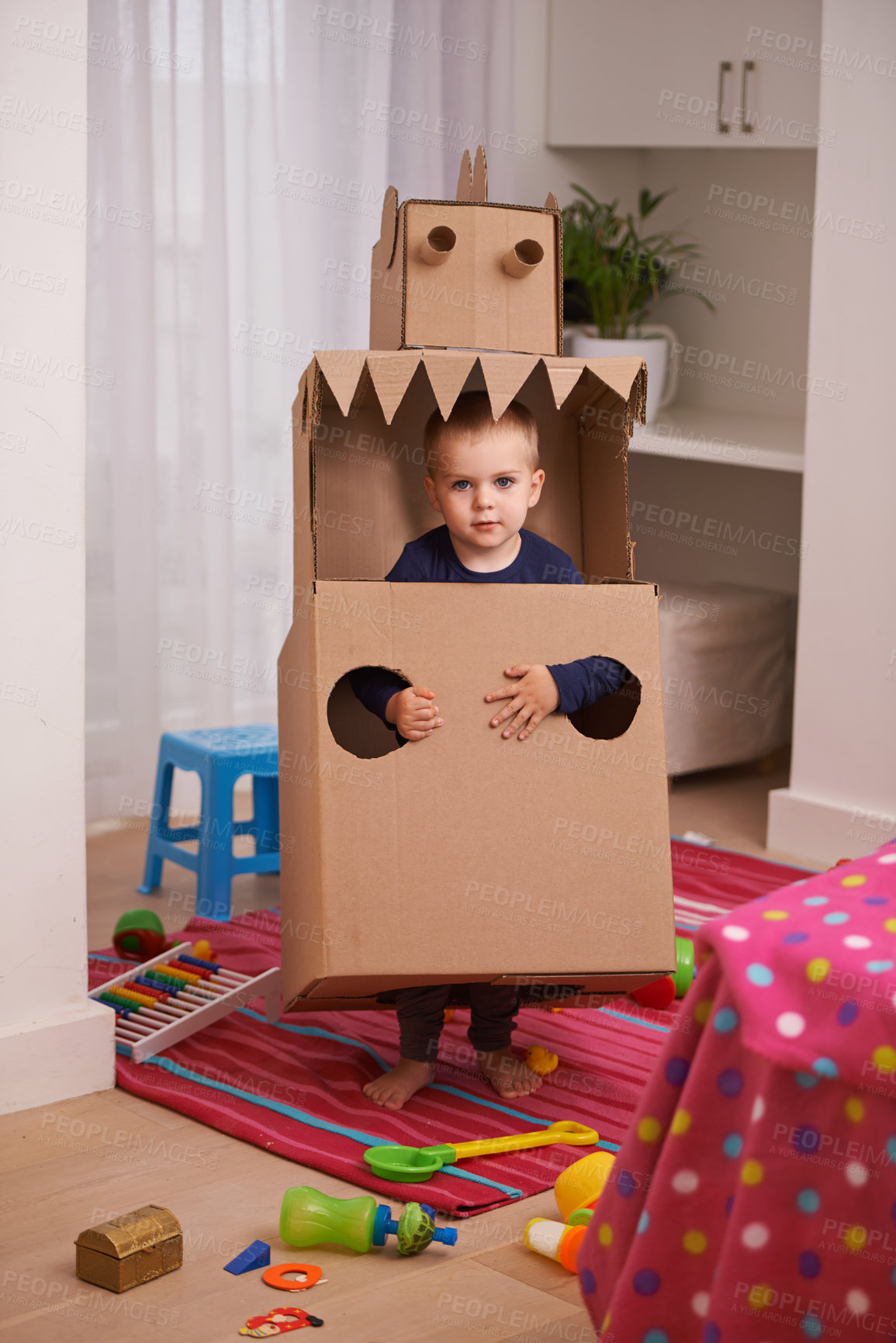Buy stock photo Child, box and play for robot and imagination in bedroom for fun and recreation in home on weekend. Young kid, toddler and innocent with costume for development and cute for toy and childhood