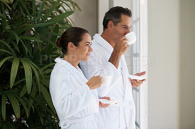 Buy stock photo Spa, couple and smile with tea for relax with bonding, wellness and hospitality by door on vacation at hotel. Man, woman and happiness with coffee for anniversary date, honeymoon and holiday retreat