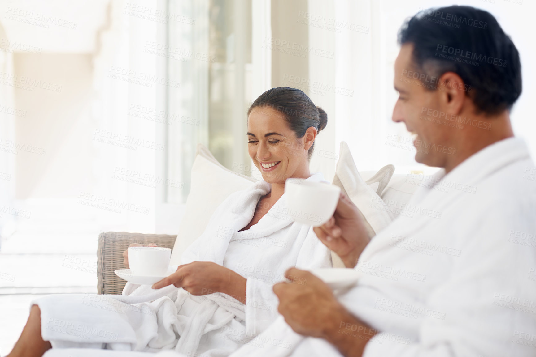 Buy stock photo Relax, coffee and smile with couple at spa for luxury, vacation and romance. Breakfast, peace and morning with happy man and woman at hotel resort for wellness, celebration and holiday travel