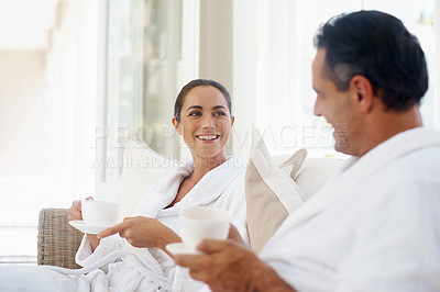 Buy stock photo Happy, coffee and smile with couple at spa for luxury, vacation and romance. Breakfast, peace and morning with man and woman relax at hotel resort for wellness, celebration and holiday travel