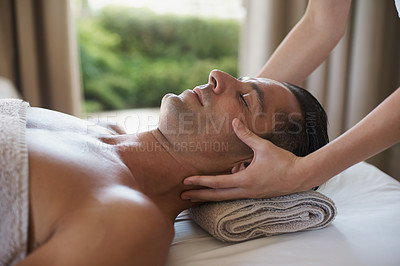 Buy stock photo Shot of a mature man enjoying a relaxing masasage