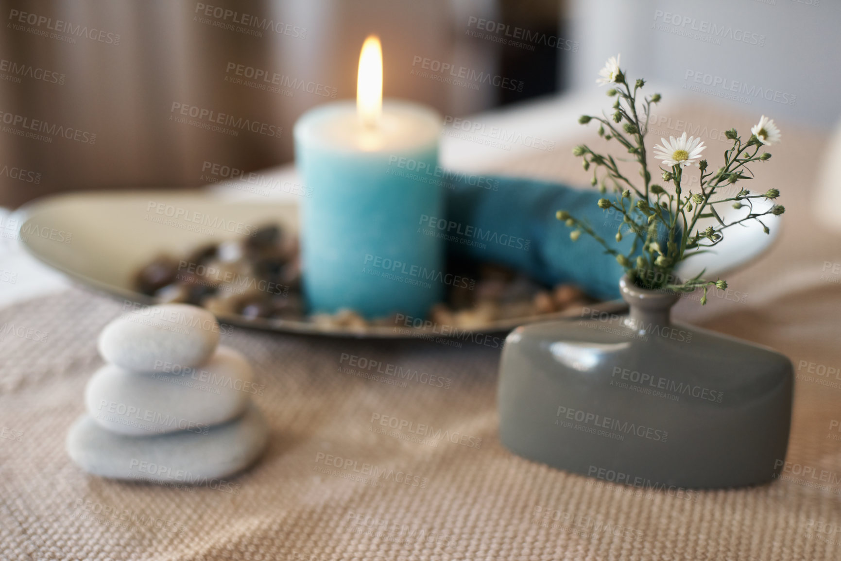 Buy stock photo Spa, aromatherapy and candles with plants, rocks for zen, calm and peace to relax for health or natural healing. Incense, wellness or stones for wellbeing, holistic massage or hospitality background